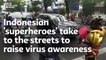 Indonesian 'superheroes' take to the streets to raise virus awareness