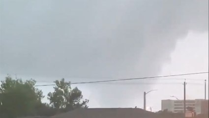 Massive waterspout spins on the horizon