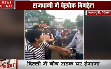 VIRAL VIDEO: स्‍कूटी सवार महिला को ट्रैफिक पुलिस ने रोका तो खड़ा हो गया बखेड़ा, आप भी देखें