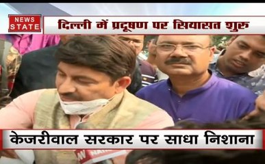 Delhi Polls: दिल्ली के प्रदूषण पर सियासत हुई शुरू,  दिल्ली BJP अध्यक्ष मनोज तिवारी ने बांटे मास्क