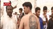 कर्नाटक चुनावः फैन ने पीठ पर बनवाया पीएम नरेंद्र मोदी का टैटू