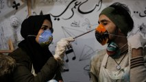 Gaza artists decorate masks to raise coronavirus awareness