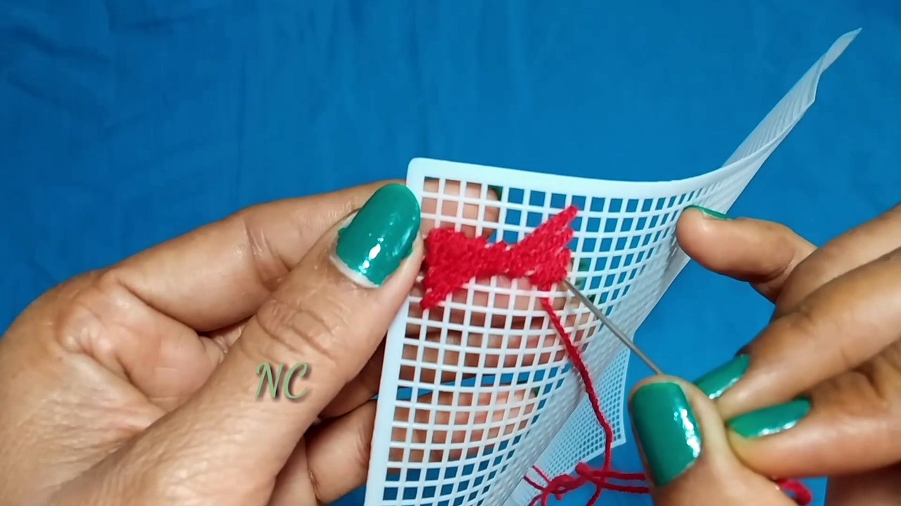 Plastic Canvas Hand fan design.