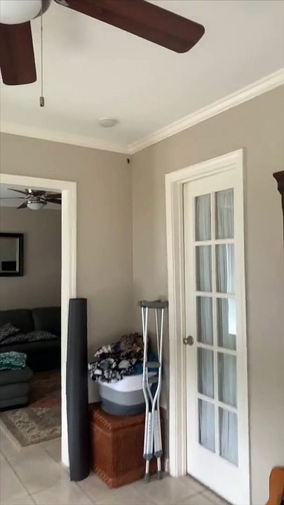 Startled Woman Screeches at Roach