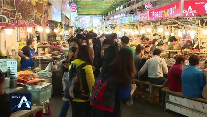 지원금 효과 나타나나…시장 활기에 소상공인 숨통