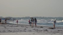 Beaches slowly re-opening in Florida