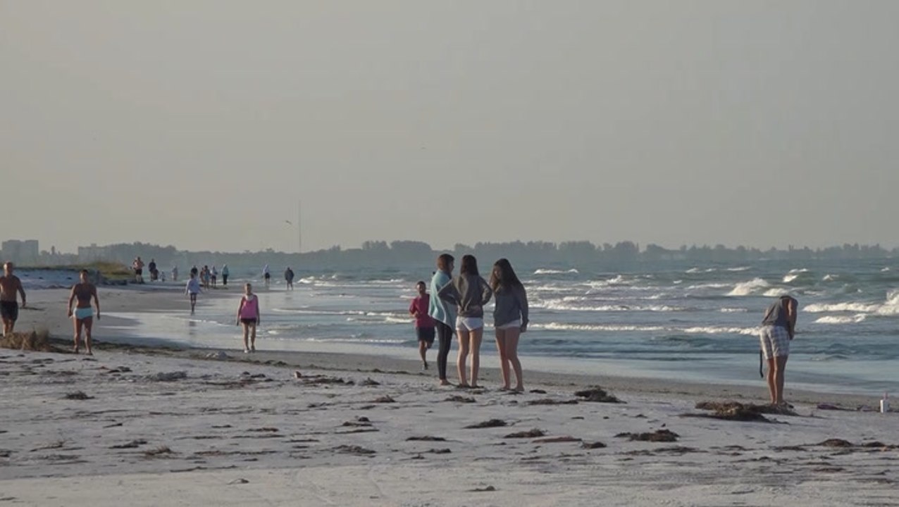 Beaches slowly re-opening in Florida