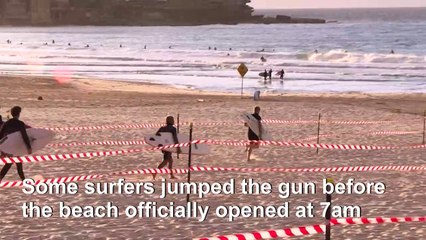 Surf's up: Sydney re-opens famous Bondi beach