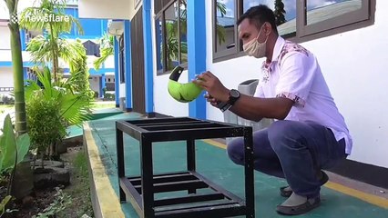 Indonesian workers transform welding masks into face shields for medical workers fighting COVID-19