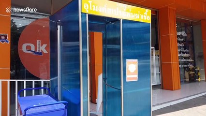 Shop in Thailand uses homemade sanitising tunnel in attempt to prevent spread of coronavirus