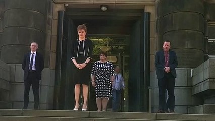 Nicola Sturgeon takes part in minute's silence for key workers