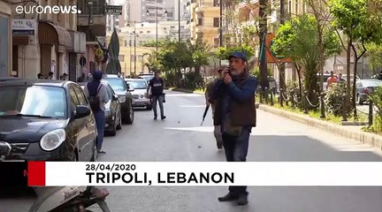 Lebanon riots: Protesters face off against police after funeral
