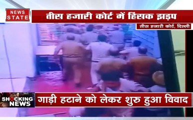 दिल्ली कोर्ट परिसर में महाभारत : वकीलों ने पुलिस के कई वाहन किए आग के हवाले