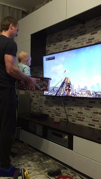 Dad Entertains his Child