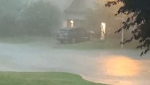 Rain pours as tornado siren roars