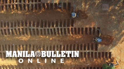 Workers dig graves at Brazil's biggest cemetery to bury virus deaths