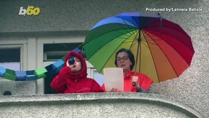 “Singing in the Rain” as Swiss Neighbors Lift Spirits During COVID-19