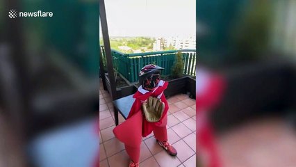 Former Italian footballer Marco Negri plays baseball on balcony during COVID-19 lockdown