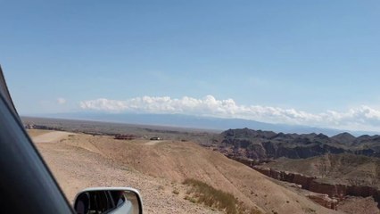 Driving around the rim of the Charyn Canyon, Kazakhstan