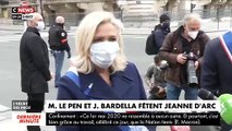 Insolite: Marine Le Pen et Jordan Bardella masqués déposent une gerbe de fleurs au pied de la statue Jeanne d'Arc