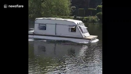 Bizarre caravan boat spotted on picturesque UK river