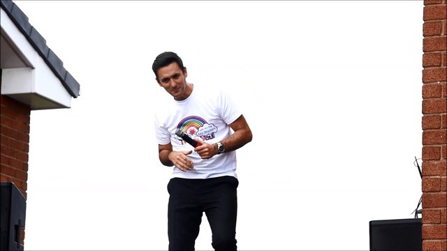 Teacher and singer Matt Ashton, entertains neighbours while raising funds for the NHS, as he sings from the roof of his garage at his Aspull home.