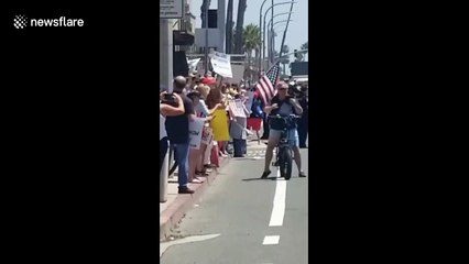 Thousands protest at Huntington Beach against California Gov. Newsome's coronavirus lockdown