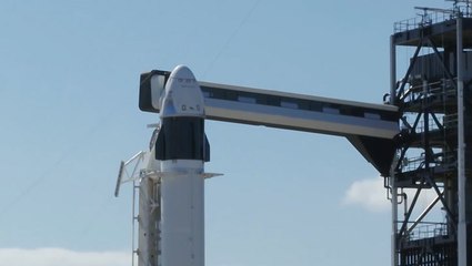 Astronauts ask public to view launch from home