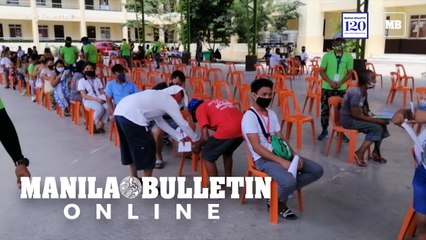 Residents of Baseco compound receive their financial assistance from the government