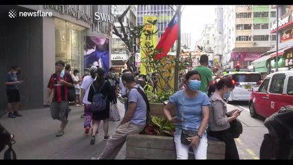 Anti-government protesters return to streets of Hong Kong as lockdown eases