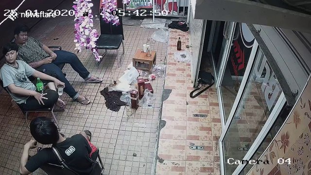 Shocking moment 'drunk driver' smashes through shop injuring three men sitting outside