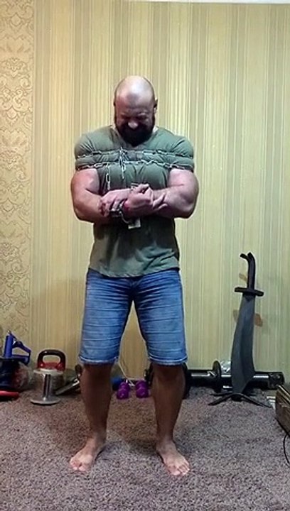 Strongman Snaps Iron Chains