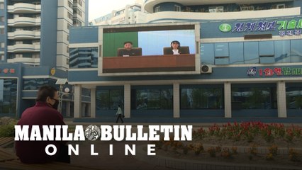 N.Koreans watch news report of event where Kim appeared