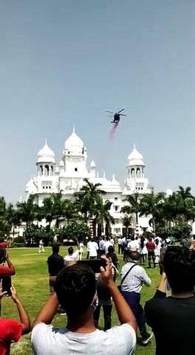 Raining of flowers from helicopter on corona warriors