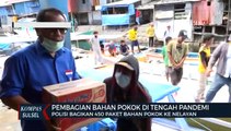Polisi Bagikan 450 Paket Bahan Pokok Ke Nelayan