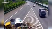 Car smashes into highway barrier head-on in southern China