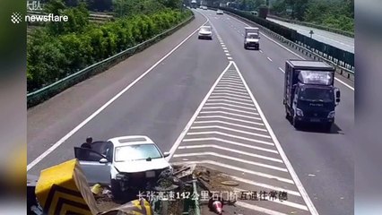 Car smashes into highway barrier head-on in southern China