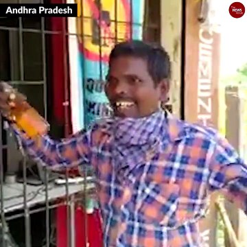 Thousands queue up to buy alcohol as liquor stores open in Karnataka, AP