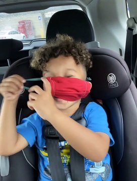 Kiddo Has Trouble Putting on Face Mask