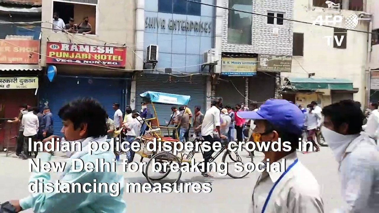 Chaos outside liquor stores as India eases virus lockdown