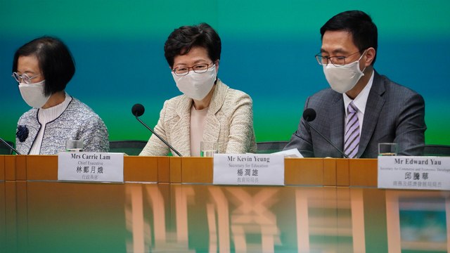 Hong Kong to distribute reusable masks, relax coronavirus restrictions
