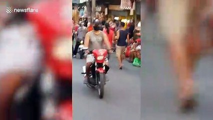 Hundreds of desperate Filipinos queue for financial help during pandemic