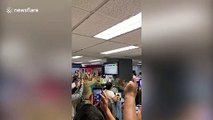 Defiant staff at ABS-CBN in the Philippines applaud after station is forced off air