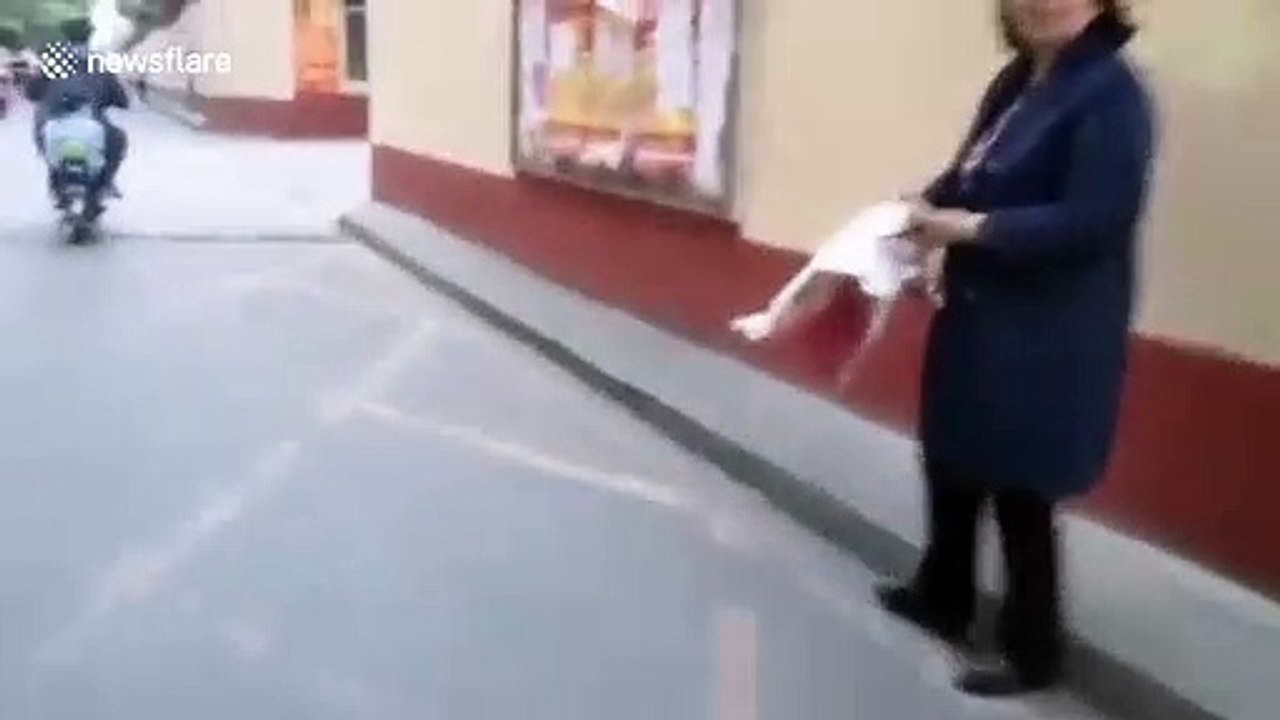 Chinese woman calls round firefighters after mi...