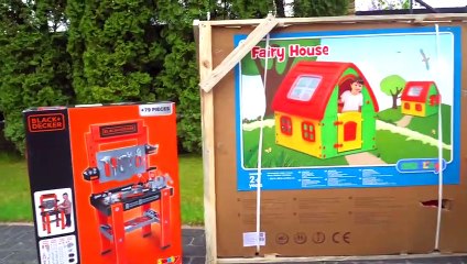 Artem plays delivery service on kids toy truck