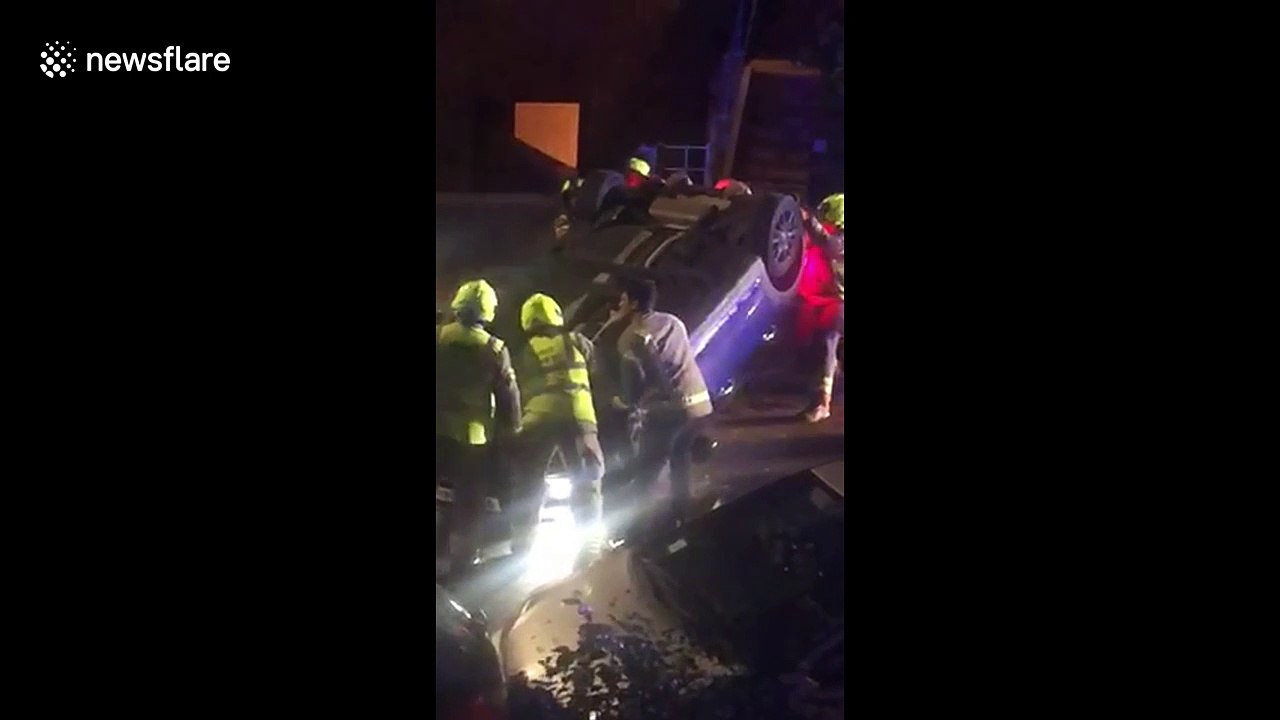 Horrific car crash in Islington area of London sees driver allegedly flee scene as first responders flip car