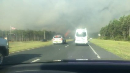 Driver captures wildfire while in traffic