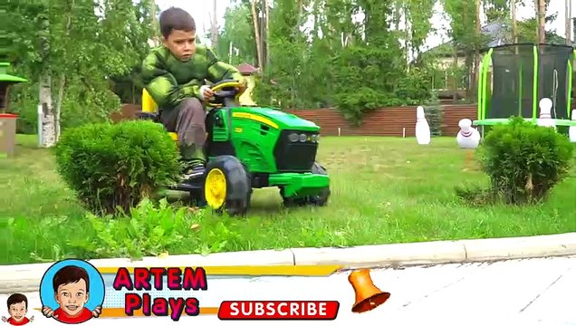 Artem chooses toy cars for Superheroes
