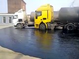 From the tanker they forgot to drain the water and poured hot bitumen