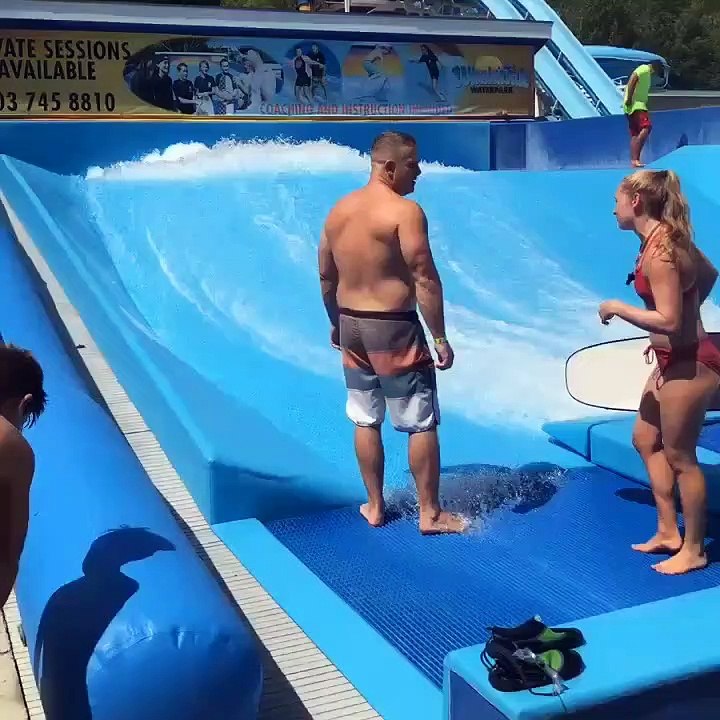 Guy Loses Balance on Wave Machine